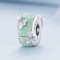 A round butterfly shaped charm - 925 sterling silver - Green