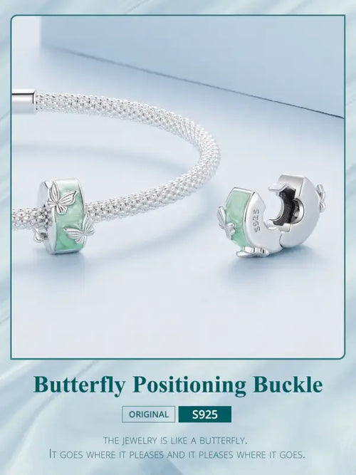 A round butterfly shaped charm - 925 sterling silver - Green