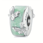 A round butterfly shaped charm - 925 sterling silver - Green
