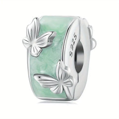 A round butterfly shaped charm - 925 sterling silver - Green