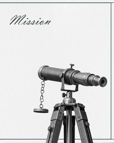 Antique brass telescope on tripod.