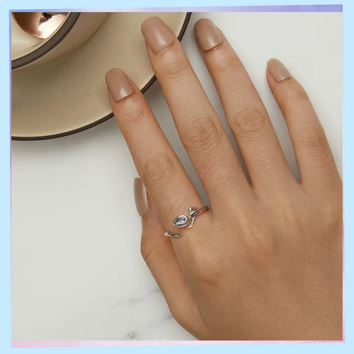 A 925 sterling silver ring with a beautiful blue tulip flower design, perfect for a spring-inspired look.