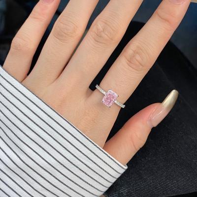 A 925 silver ring with pink ice-crushed texture and sparkling zirconia stones, perfect for a glamorous touch.