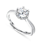 925 sterling silver ring featuring a shiny moissanite stone in a sun design, offering brilliance and warmth.