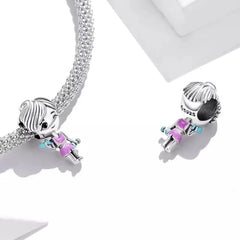 925 sterling silver dangle charm featuring a small female figure - Multi Color - Charms