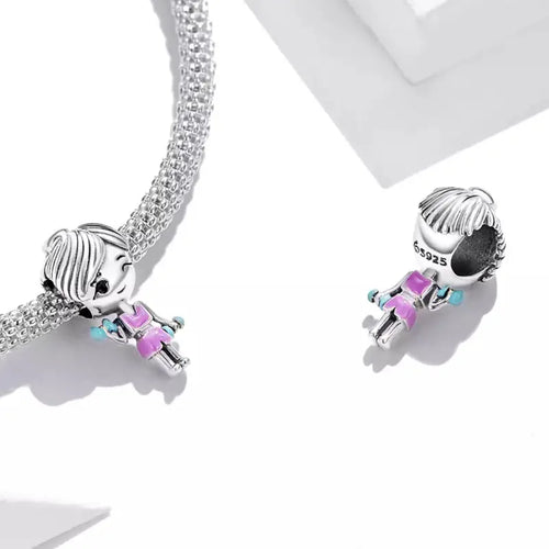 925 sterling silver dangle charm featuring a small female figure - Multi Color - Charms
