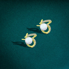 925 sterling silver earrings plated with 18k gold in an open heart shape - fathyibrahim