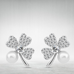 925 sterling silver set adorned with zircon stones in the shape of a flower. - fathyibrahim
