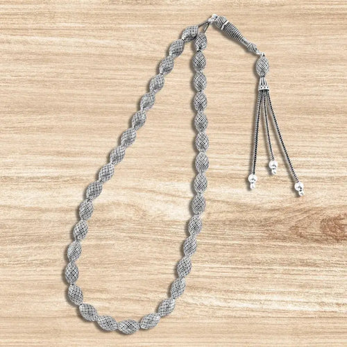 999 silver prayer bead with finely engraved oval-shaped beads - Rosary