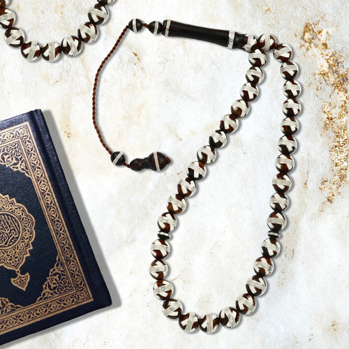 Rosary made of fine coke inlaid with silver, 33 beads