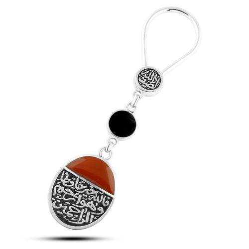 Egyptian sterling silver keychain with **two-sided design**.