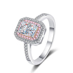 925 sterling silver ring with an emerald-cut Moissanite stone, delivering exceptional brilliance and fire.