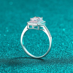 A 925 silver ring featuring an emerald-cut Moissanite stone, known for its stunning brilliance and clarity.