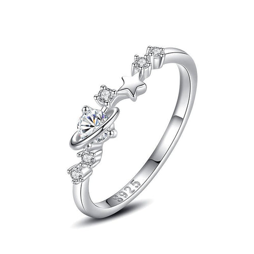 925 sterling silver ring featuring a planet and stars design, perfect for a celestial-inspired look.